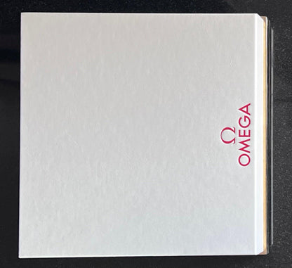 Omega Retail Display-Gold Base-White Leather-Embossed Iconic Red Omega Logo-Mint