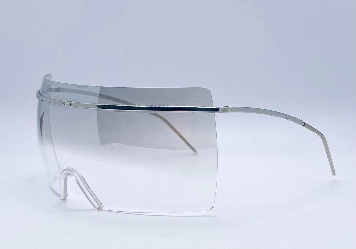 Chanel 4045 c.124|57 Vintage 2000s Shield Sunglasses-Silver Metal, Grey to Clear Gradient lens
